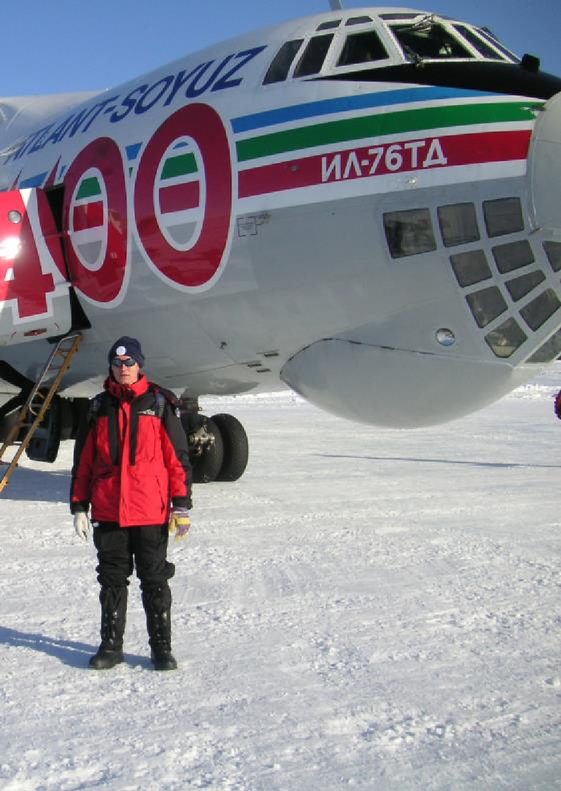 Booyens in Antarctica in front of the Russian Soyuz aeroplane, 2003